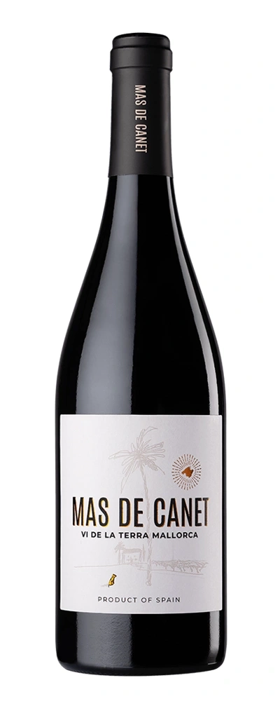 Eine Flasche Rotwein mit dem Etikett Mas de Canet, Vi de la Terra Mallorca, Produkt von Spanien.
