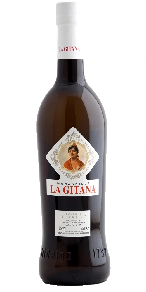 Eine Flasche La Gitana Manzanilla Sherry mit einem Bild einer Frau auf dem Etikett.