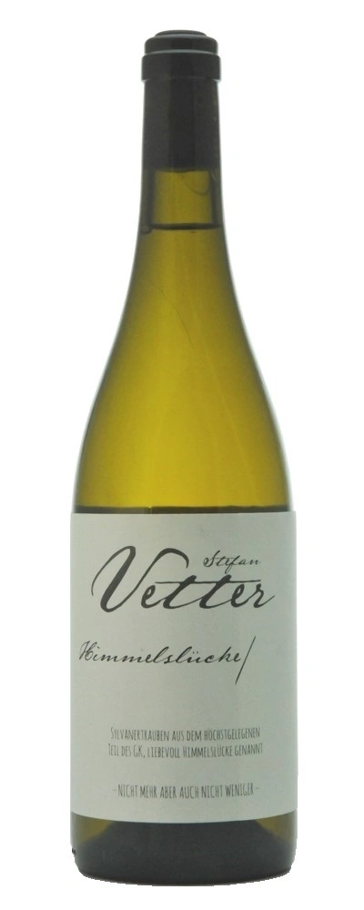 Weinflasche mit dem Etikett 'Vetter Himmelslicke' und Text über den Wein.